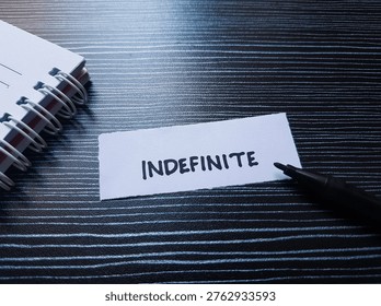 Indefinite writting on table background. 