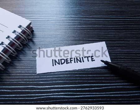 Indefinite writting on table background. 