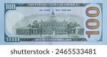 Independence Hall on 100 dollars banknote back side closeup macro fragment. United states hundred dollars money bill close up