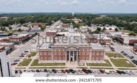 Independence, Missouri, USA - June 16, 2023: Afternoon sunlight shines on the historic core of downtown Independence.