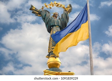 Independence Monument And Ukrainian Flag In Kiev.  Ukraine