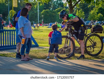 Independence, OHUSA - July 3, 2016 - Police Officer Interacting With Child And Familyat City Firework Show