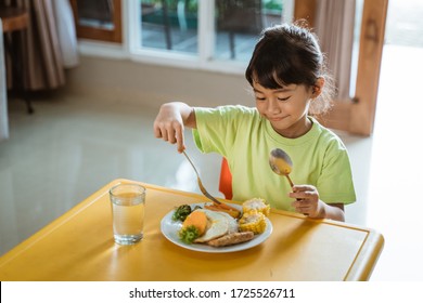 Independent Kid Self Eating At Home Having Some Breakfast