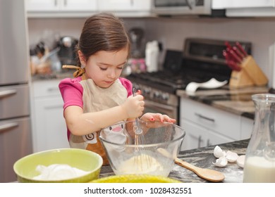 Independent Little Girl Cooking Apple Pie Alone, Without Parents Help