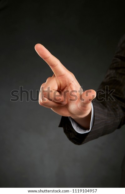 Index Finger Poiting Towards One Direction Stock Photo Edit Now