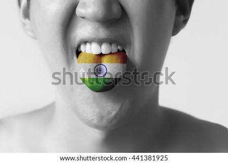 India flag painted in tongue of a man - indicating Hindi or Tamil language and speaking in Black and White