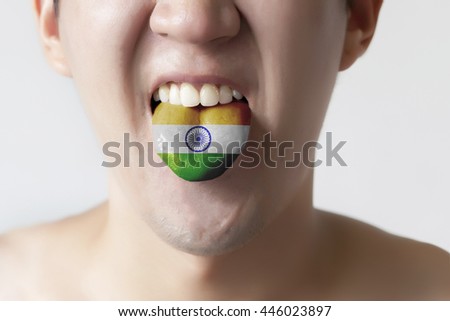 India flag painted in tongue of a man - indicating Hindi or Tamil language and speaking