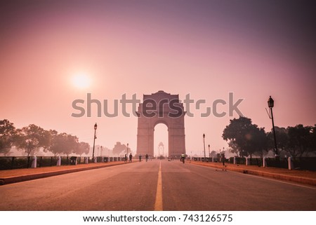 india gate, new delhi, india - morning sun rise 