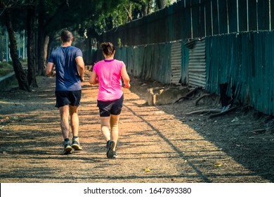 INDIA, KOLKATA, 9th FEBRUARY 2020: Indian Young Couple Jogging At Outdoor In Nature.