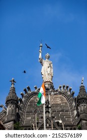 India, Maharashtra, Mumbai, August 31, 2009: Statue of Progress at Chhatrapati Shivaji Maharaj Terminus building, formerly Victoria Terminus. 