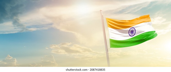 India National Flag Waving In Beautiful Sky.