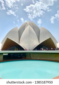INDIA, NEW DELHI - MARCH 20, 2019: Worshippers visiting the Bahá’í House of Worship, better known as the Lotus Temple, a non-denomination house of worship.