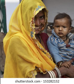 India, Rajasthan, Pushkar, Indian Woman With Her Baby