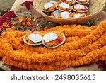 India, Uttar Pradesh, Varanasi. Wreaths of marigolds and other offerings.