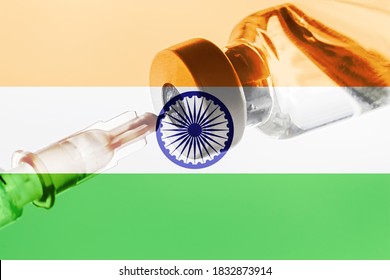 India Vaccination, Coronavirus, India flag, Vaccine vial dose, needle syringe, concept vaccination - Powered by Shutterstock