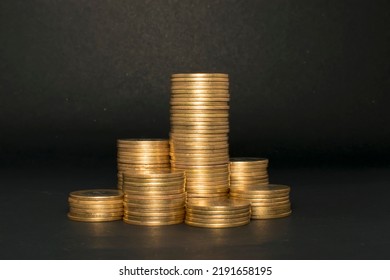 Indian 10 rupees coins Golden coins, stack of coins, coin growth, golden coins graph - Shutterstock ID 2191658195