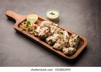 Indian Afghani chicken Malai Tikka is a grilled Murgh creamy kabab served with fresh salad