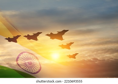 Indian Air Force Day. Indian jet air shows on background of sunset with transparent Indian flag. Commemorate Indian Air Force Day on October 8 in India. - Shutterstock ID 2210693555