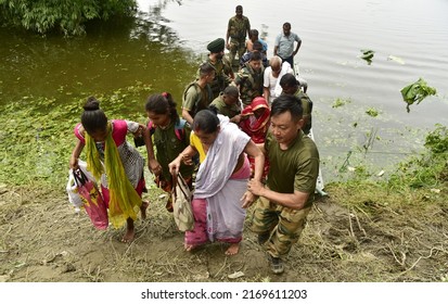 Indian Army Rescue Flood Affected Villagers At Kalita Kuchi In Kamrup District Of Assam India On Monday 20th June 2022.