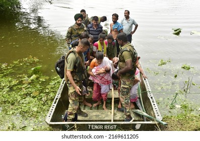 Indian Army Rescue Flood Affected Villagers At Kalita Kuchi In Kamrup District Of Assam India On Monday 20th June 2022.