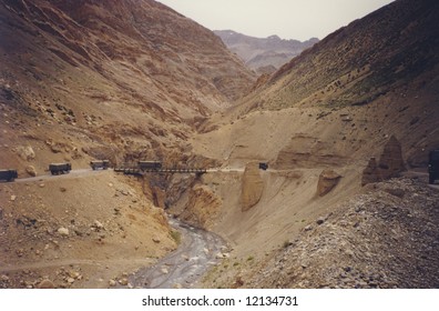 Indian Army Trucks Crossing River In Kashmir.