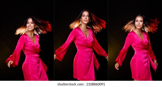 Indian Asian 20s Tanned Skin Woman Wear Pink Shinny Dress Express Feeling Happy Smile. Fashion Female Poses Spin Throw Hair In Air With Back Light Backlit Half Body Over Gray Dark Background Isolated