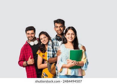 Indian asian college students group photo against white background - Powered by Shutterstock