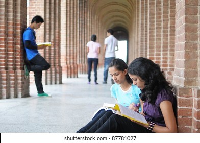 Indian / Asian College students preparing for examination.