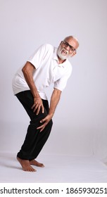 Indian Asian Old Man Having Knee Pain Or Ache In Sad Expressions.