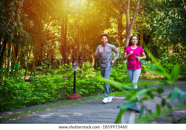 Indian Asian Young Couple Jogging Running Stock Photo (Edit Now) 1859973460