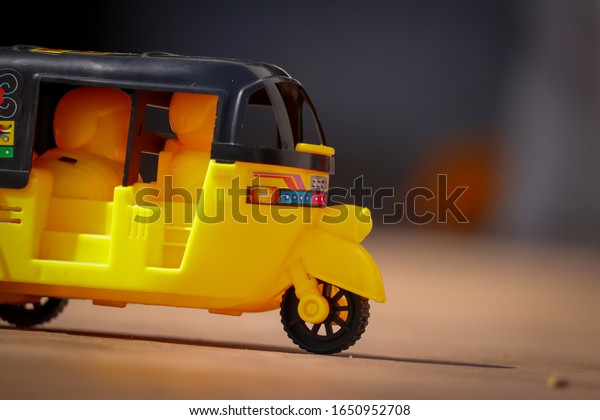 Indian Auto Rickshaw ,Yellow and black auto\
rickshaw toy,beautiful view of indian\
