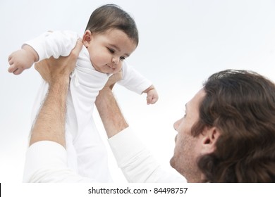 Indian Baby Girl And A Caucasian Father, Biracial Ethnic Family.