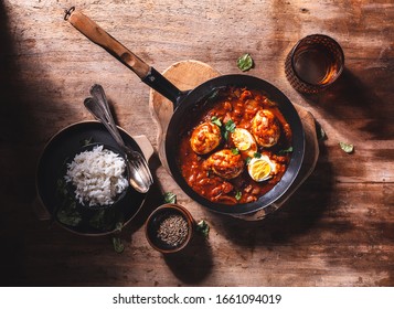 Indian Boiled Eggs Masala in Masala Curry Sauce - Powered by Shutterstock