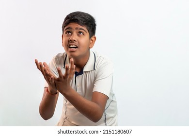 Indian Boy catching cricket ball