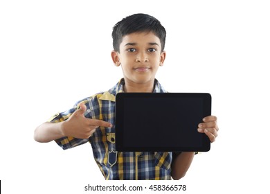 Indian Boy Holding Tablet