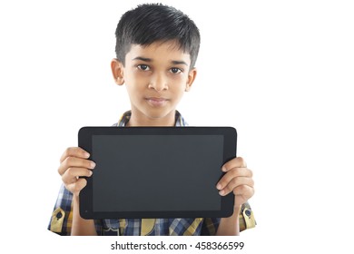 Indian Boy Holding Tablet