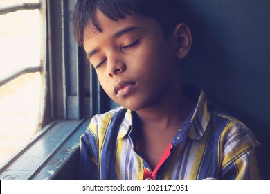 Indian Boy Sleeping In Train