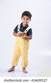 Indian Boy Standing Over White Background, Smiling