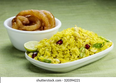 Indian Breakfast Combination Poha And Jalebi (indian Sweets).