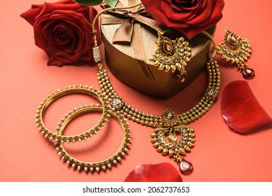 Indian bridal jewelry set. Antique finish gold necklace and bangles with gift box. - Shutterstock ID 2062737653