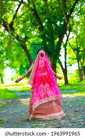 Indian Bridal In Traditional Wear And Enjoying Nature