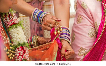 Indian bride and groom during Gath Bandhan ritual ceremony
