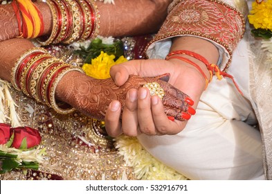 An Indian Bride And Groom Holding Their Hands During A Hindu Wedding Ritual.Image Captured At A Marriage Ceremony In India.Image Date:8th December 2012