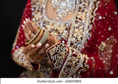 Indian Bride Putting On Bangles