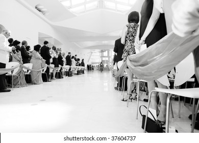 An Indian Bride In A Red Sari Walks Down The Aisle