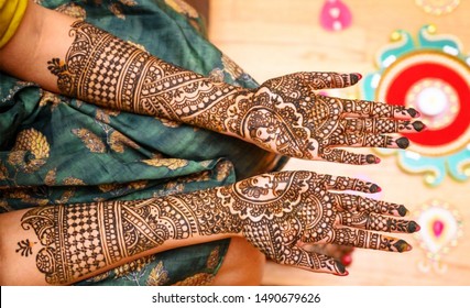 Indian Bride Showing Hands Mehndi Design