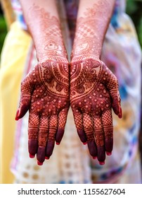 Indian Bride Showing Mehndi Tattoos Design