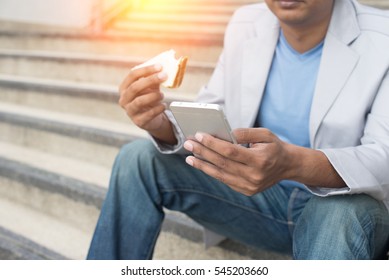 Indian Business Male Eating Bread