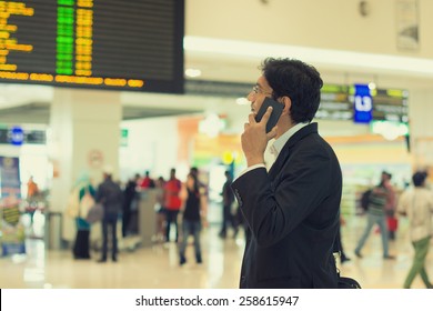 Indian Business Male With A Phone At The Airport