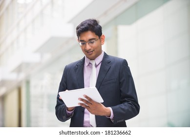 Indian Business Male With A Tablet